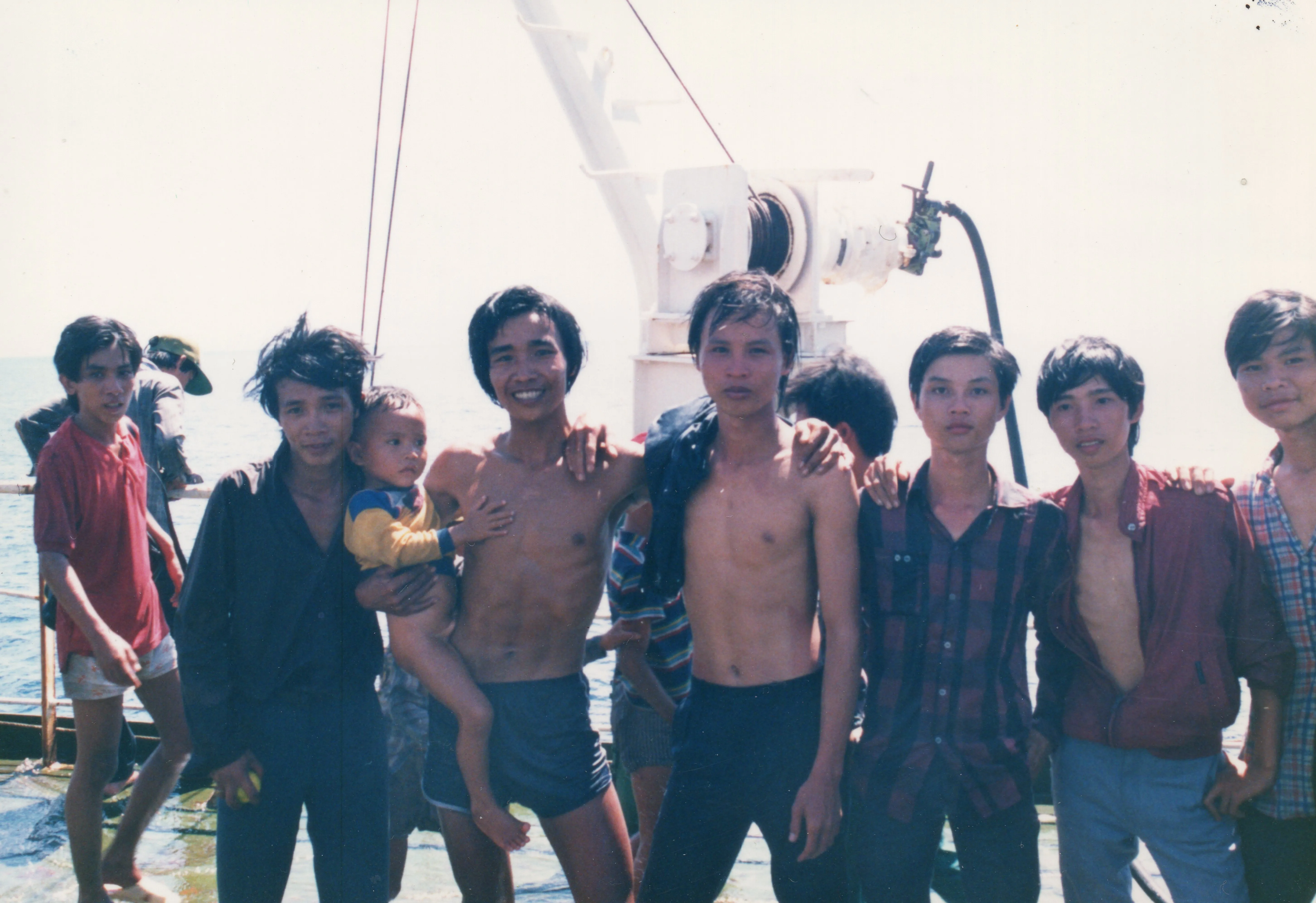 My father, second on the right, wearing the red shirt.